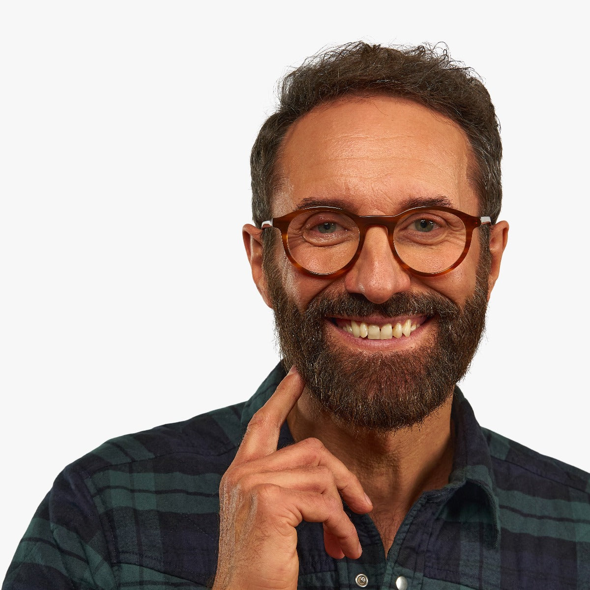 Person wearing Løkken Shiny Walnut glasses