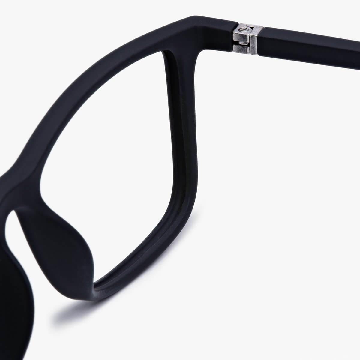Black, minimalist men's Skagen eyeglasses frame close-up