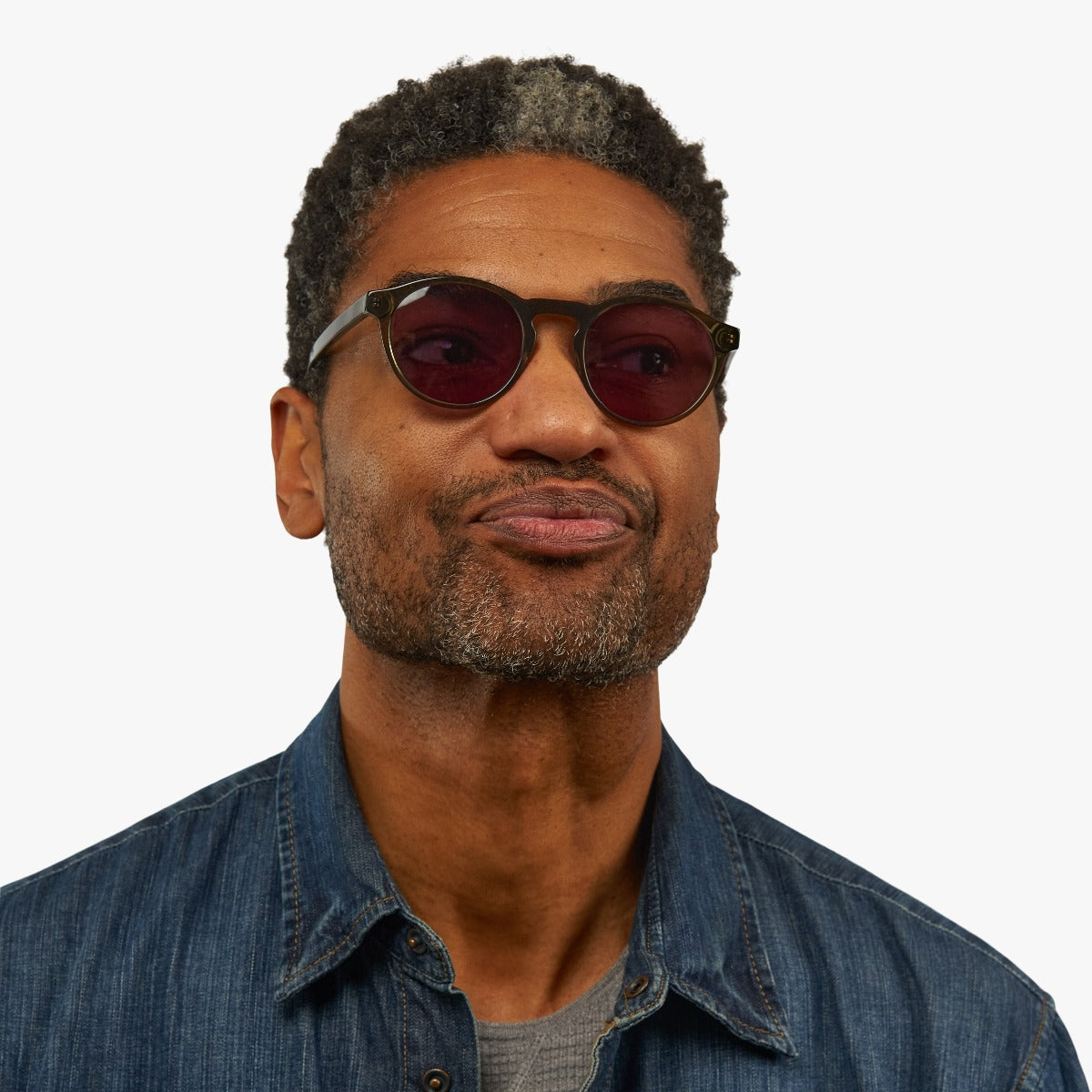 Person wearing Trondheim Shiny Olive sunglasses