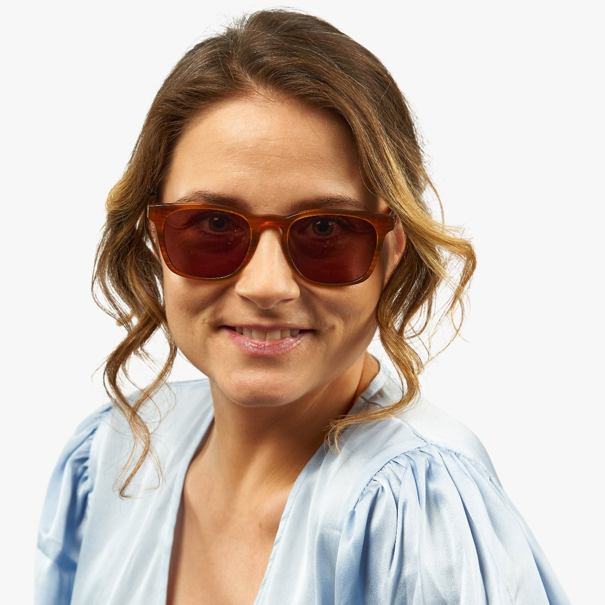 Person wearing Women's Bornholm Shiny Walnut glasses